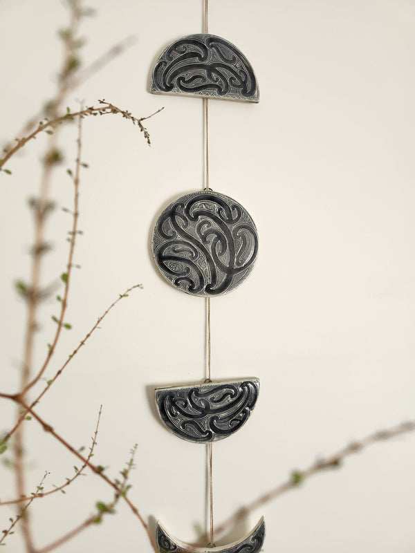 Ngā mata o te marama- Ceramic moon phases: Black on White