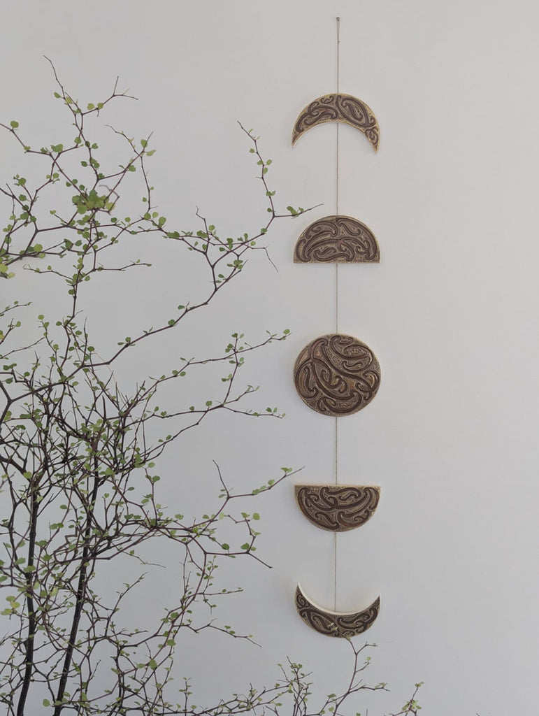 Ngā mata o te marama- Ceramic moon phases: Parauri
