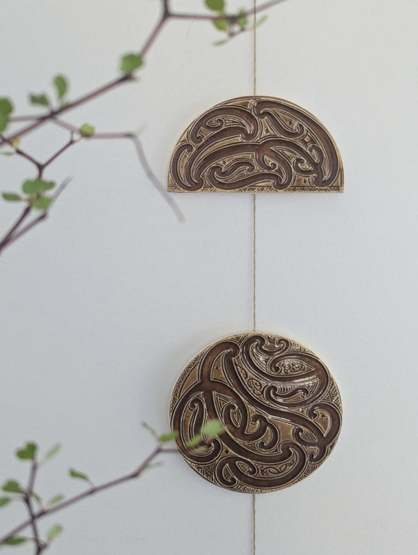 Ngā mata o te marama- Ceramic moon phases: Parauri