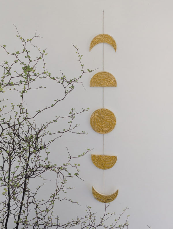 Ngā mata o te marama- Ceramic moon phases: Amber