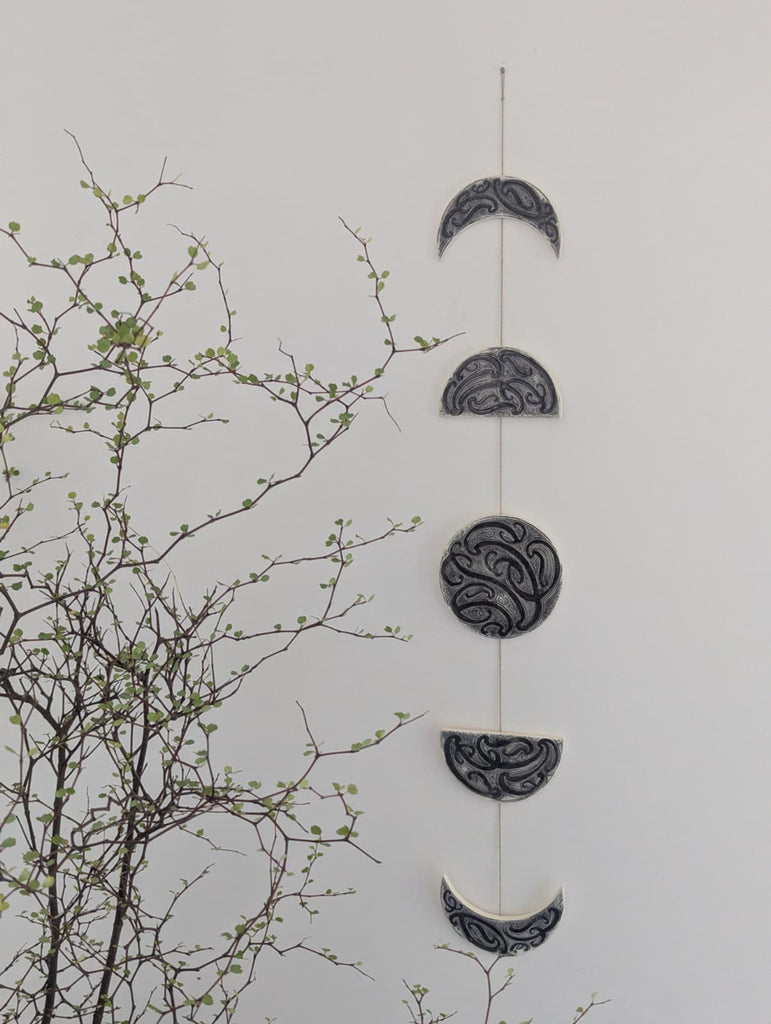 Ngā mata o te marama- Ceramic moon phases: Black on White